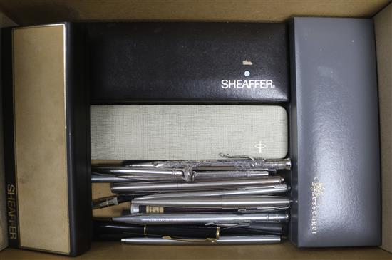 A group of fountain pens and two silver propelling pencils